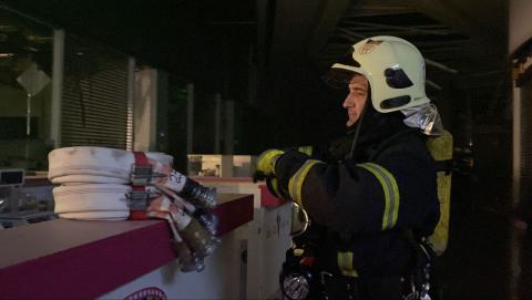 Rescuers eliminate a strong fire on the territory of one of the shopping centers in Podolsky district of Kyiv