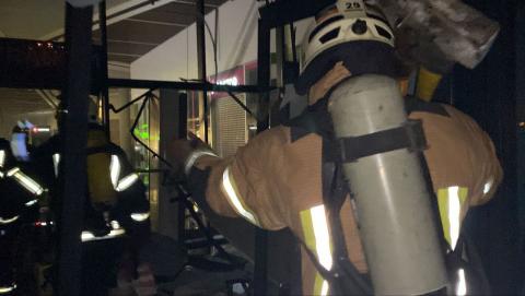 Rescuers eliminate a strong fire on the territory of one of the shopping centers in Podolsky district of Kyiv